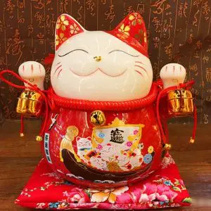 Đặc điểm, ý nghĩa mèo thần tài cầm chuông gió